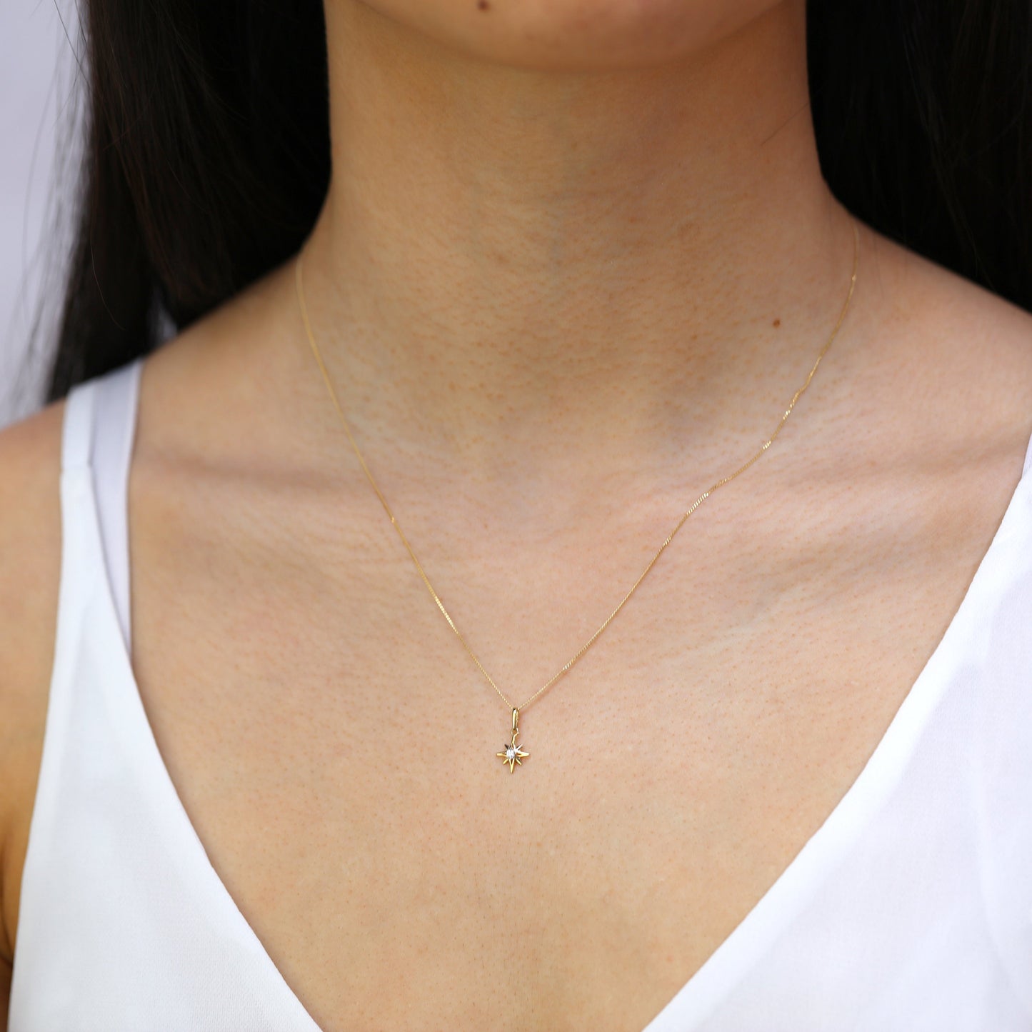 Collier avec pendentif étoile brillante en or 9 carats et cristal CZ transparent