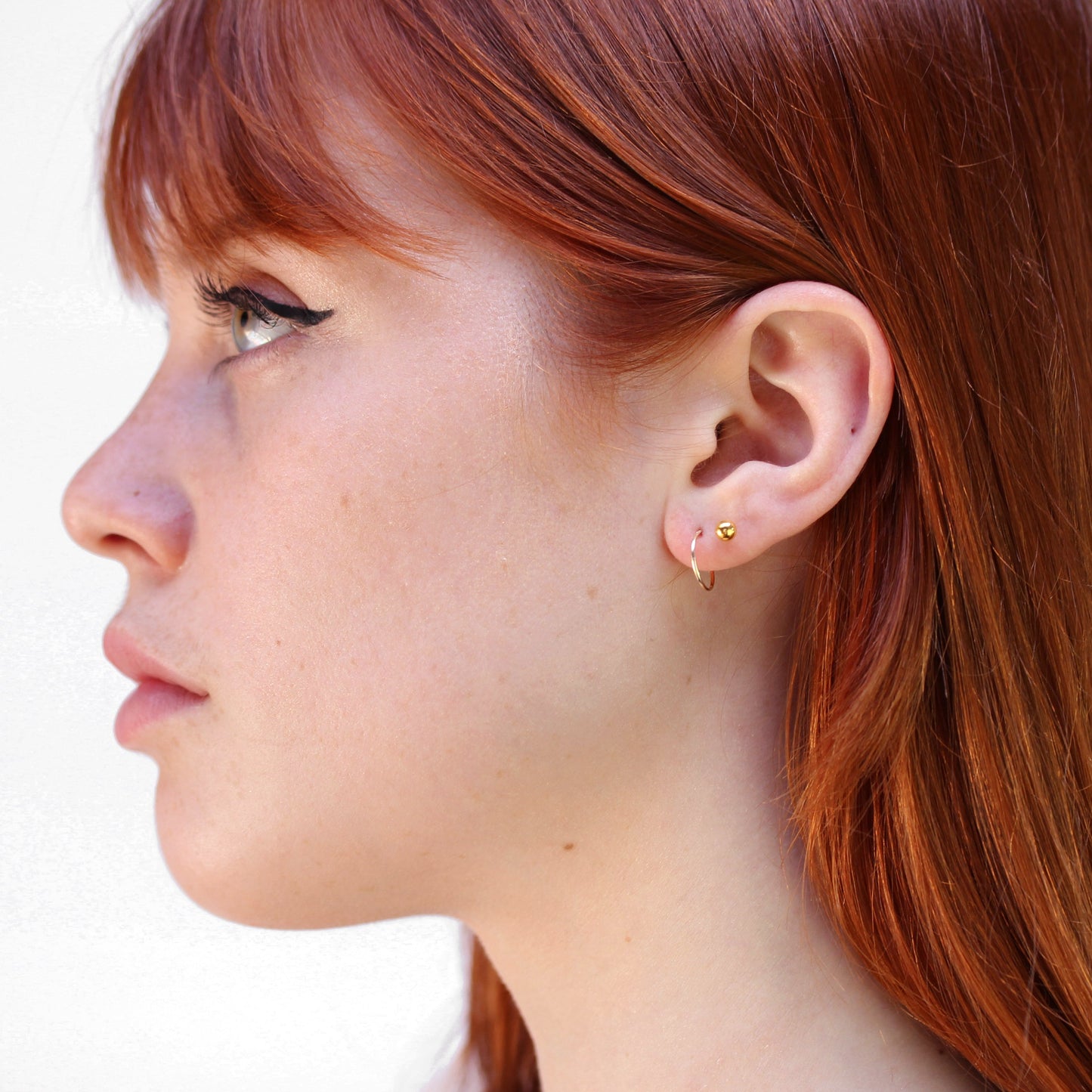 Boucles d'oreilles créoles légères en or 9 carats de 10 mm