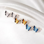 Boucles d'oreilles papillon plates en argent sterling et émail