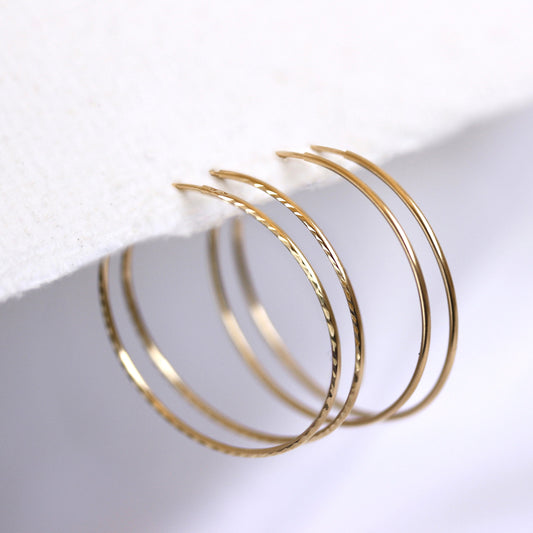 Boucles d'oreilles créoles légères en or 9 carats de 21 mm - Unis - Taille diamant - Créoles - Dormeuses