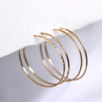 Boucles d'oreilles créoles légères en or 9 carats de 21 mm - Unis - Taille diamant - Créoles - Dormeuses