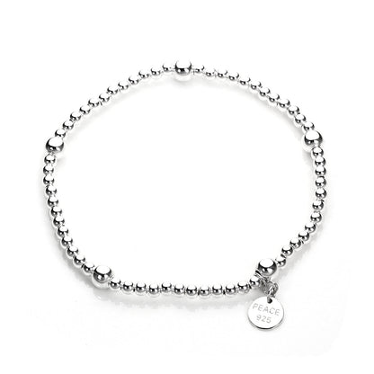 Bracelet à breloques extensible en argent sterling avec perles