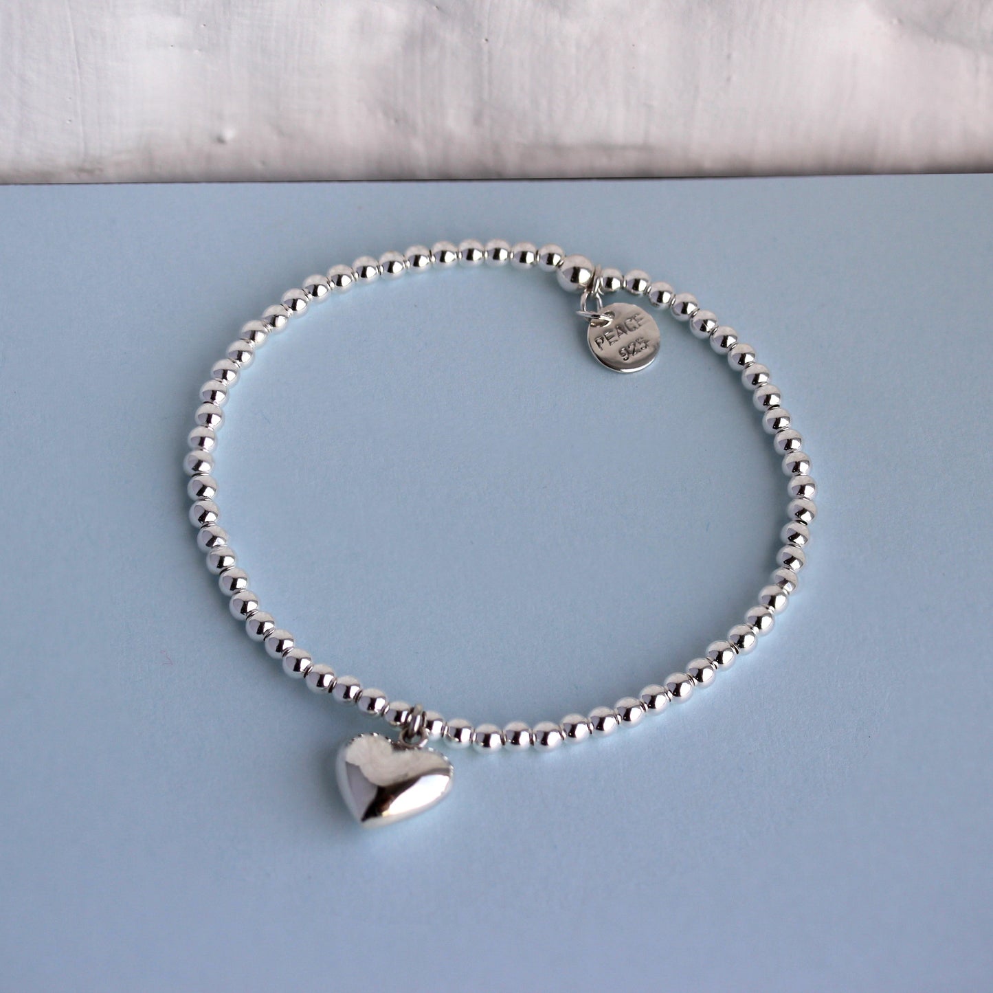 Bracelet extensible en argent sterling avec breloque en forme de cœur et perles