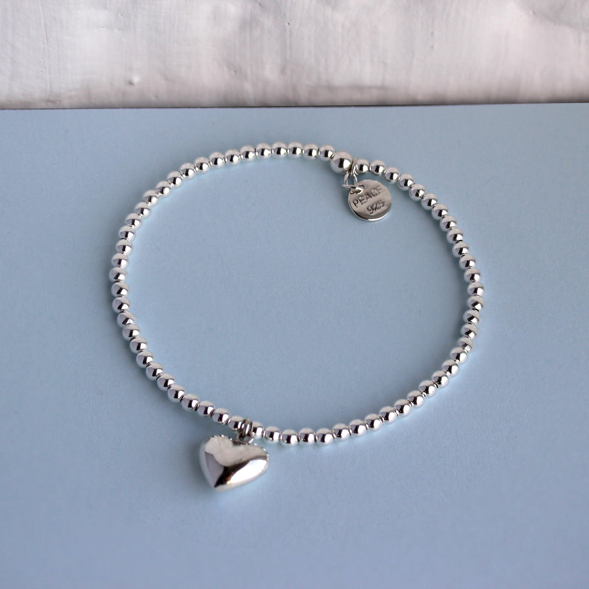 Bracelet extensible en argent sterling avec breloque en forme de cœur et perles