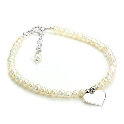 Bracelet réglable en argent sterling et perles d'eau douce blanches avec breloque cœur