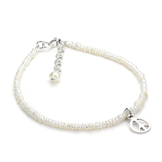 Bracelet en argent sterling et perles d'eau douce blanches avec breloque paix