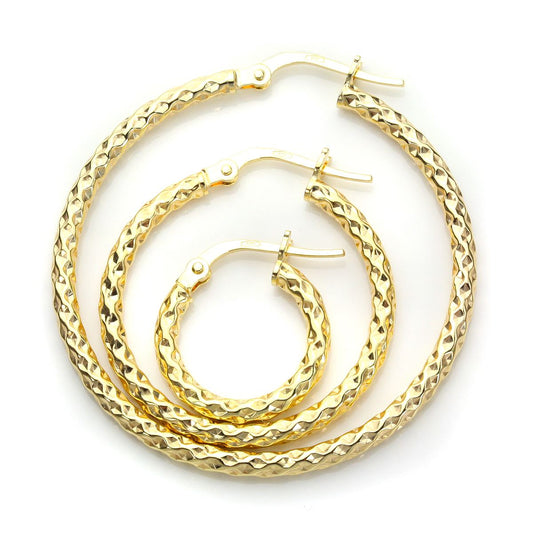 Boucles d'oreilles créoles torsadées en or jaune 9 carats